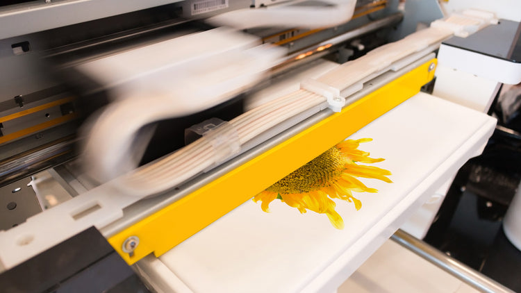 Digital printing press producing sunflower print on fabric