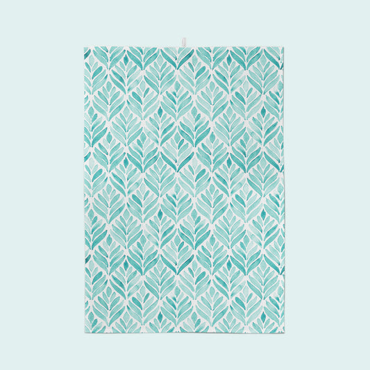 A blue leaf patterned tea towel