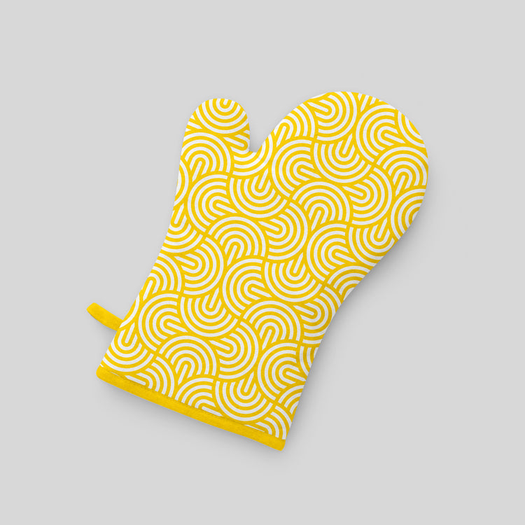 Bright yellow geometric patterned oven glove