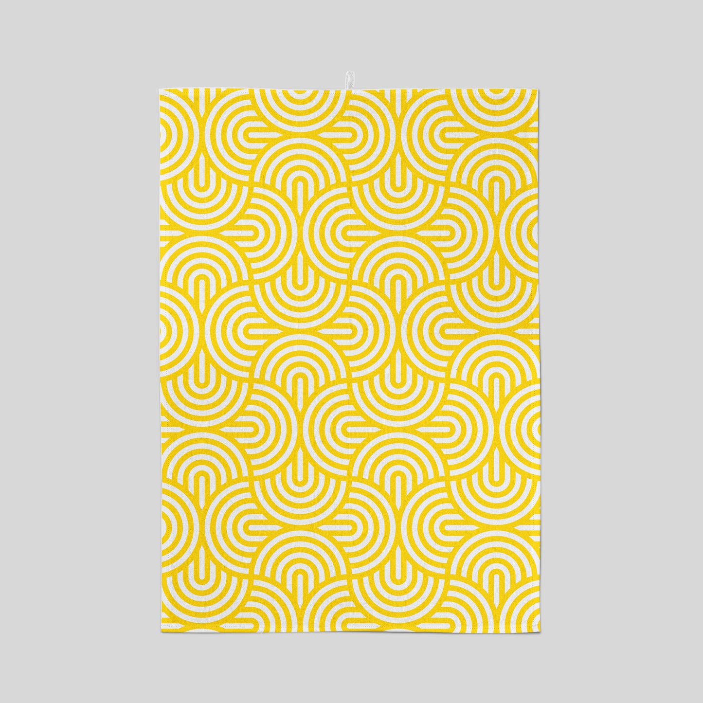 Screen printed tea towel with bright yellow geometric pattern
